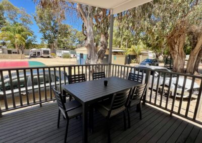 Wooden black dining area in a balcony