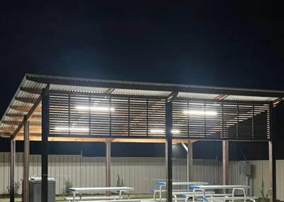 A covered indoor rest area at night